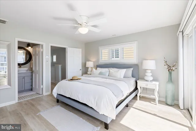 an aerial view of a house with a lake view