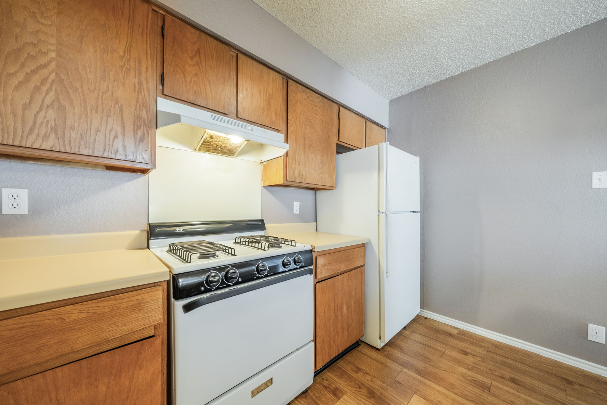 5807 Spring Meadow Road, Unit B Austin, TX 78744 - Photo 14 of 31 Functional kitchen with ample cabinetry and a reliable range.