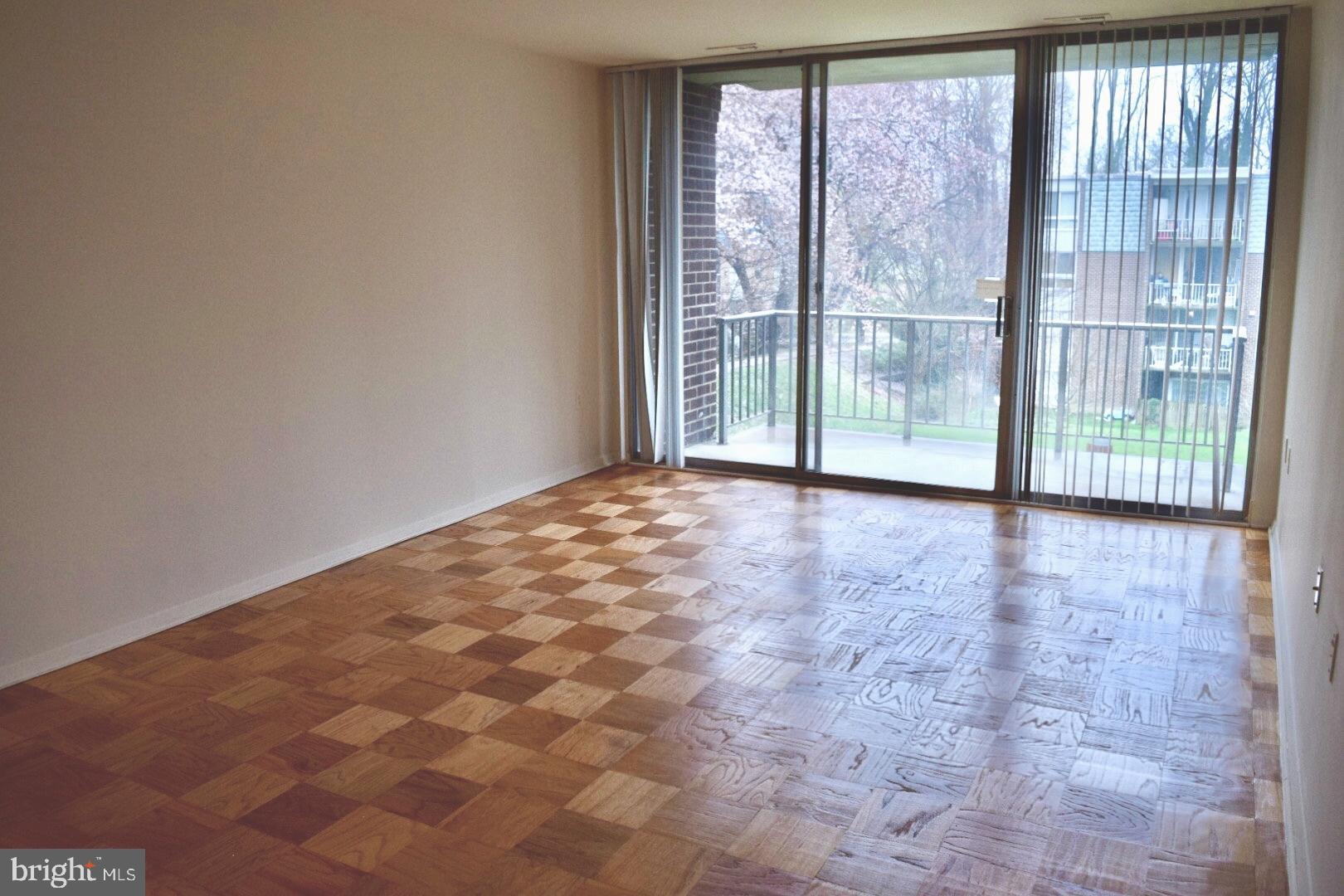 3970 Bel Pre Road, Unit 39705 Silver Spring, MD 20906 - Photo 18 of 30 Spcious living room
