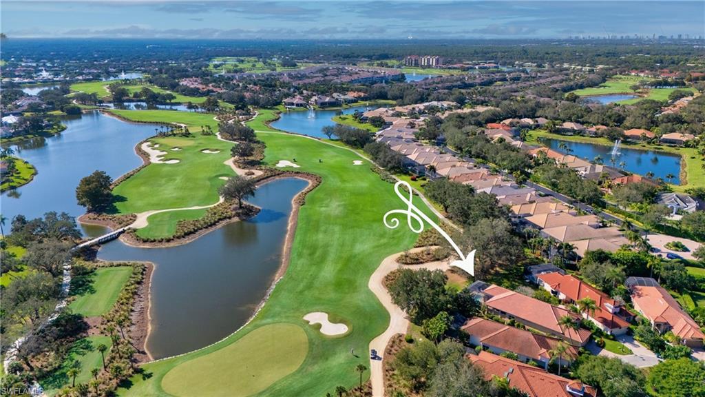 1033 Tierra Lago Way Naples, FL 34119 - Photo 27 of 27 an aerial view of a residential houses with outdoor space and a lake view