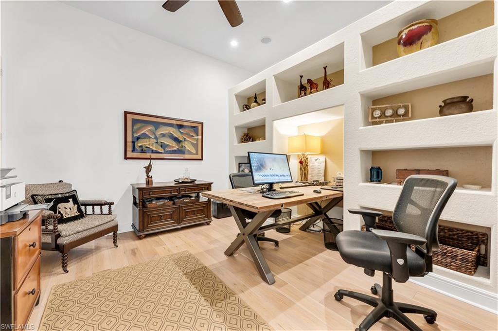 1033 Tierra Lago Way Naples, FL 34119 - Photo 10 of 27 a workspace with a workspace