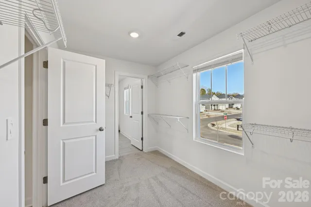 a view of kitchen and wooden floor