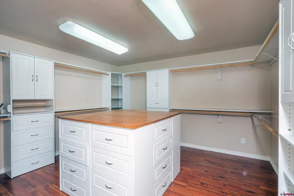 a kitchen with a stove and a refrigerator