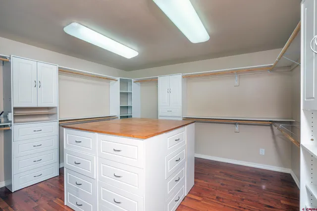 a kitchen with a stove and a refrigerator