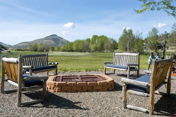 a view of a patio with chair and table
