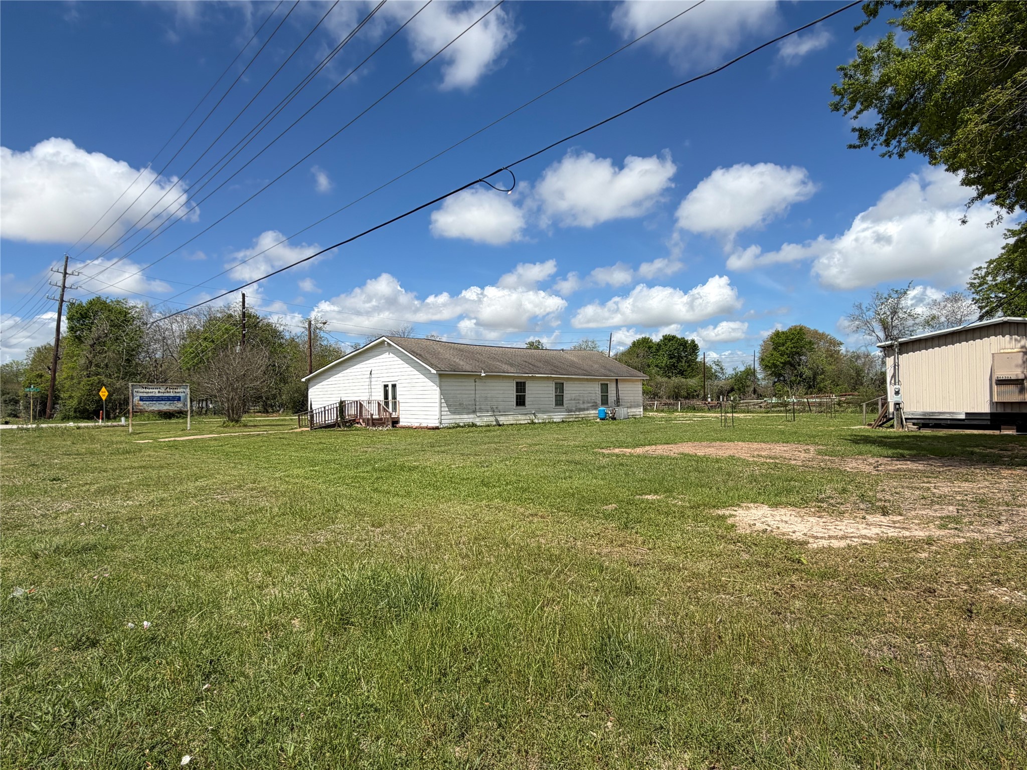 Gorgeous sky views and plenty of green space surround this property located in front of Betka Rd