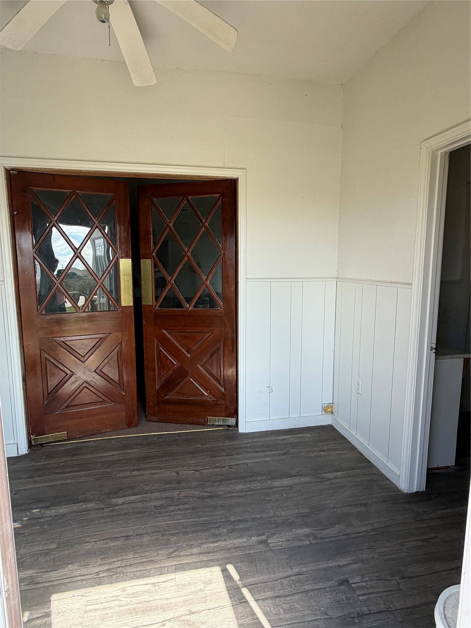 26630 Betka Road Hockley, TX 77447 - Photo 6 of 11 Foyer area with women’s bathrooms and men’s bathrooms to the side