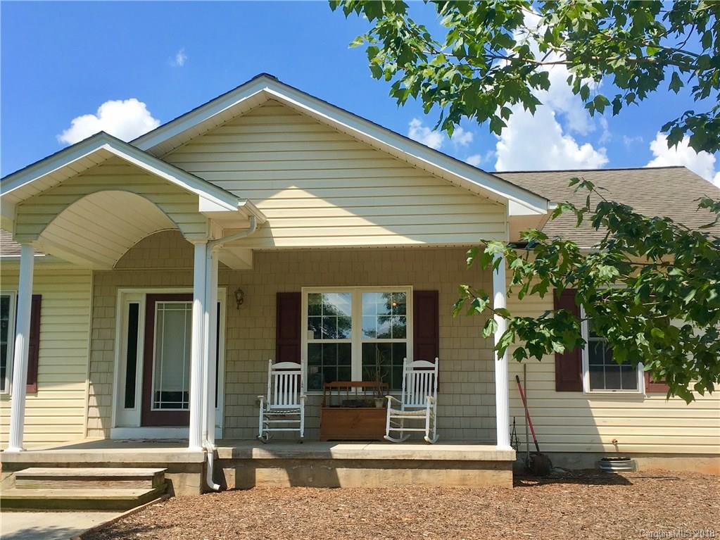 1045 Tabor Road, Unit 21 Olin, NC 28660 - Photo 2 of 23 a front view of a house