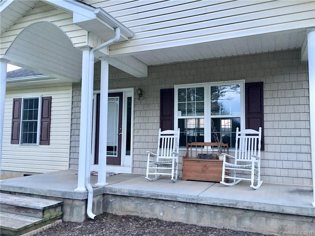 1045 Tabor Road, Unit 21 Olin, NC 28660 - Photo 19 of 23 a house view with a outdoor seating space