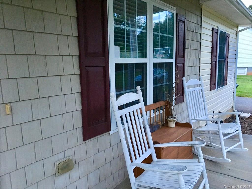 1045 Tabor Road, Unit 21 Olin, NC 28660 - Photo 20 of 23 a view of balcony with two chairs