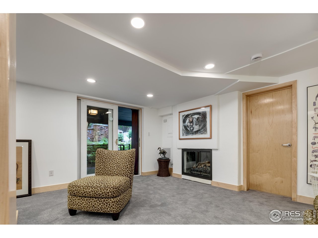 1006 6th Street Boulder, CO 80302 - Photo 30 of 40 a living room with furniture and a fireplace