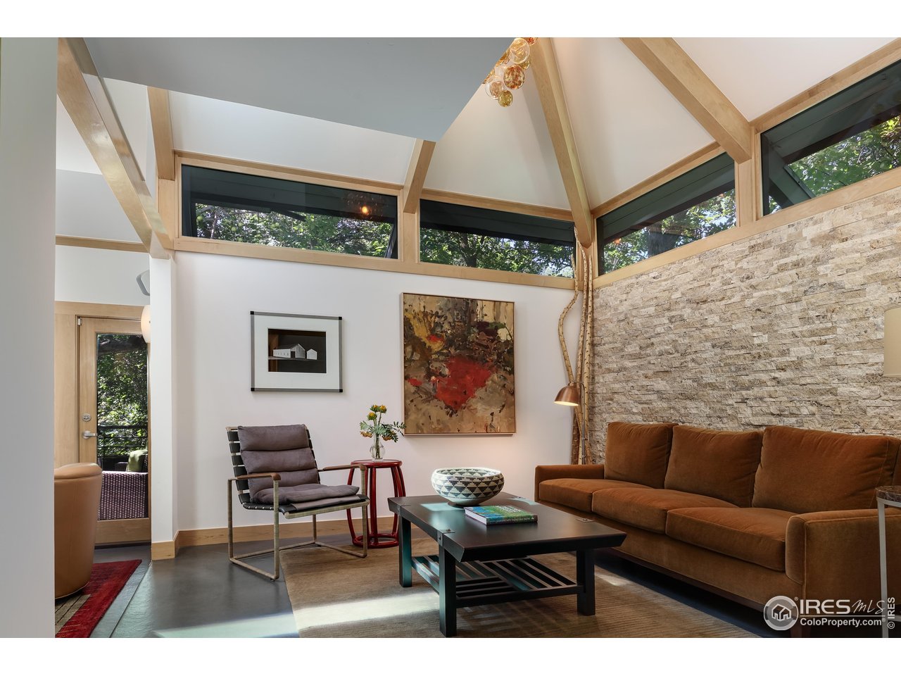 1006 6th Street Boulder, CO 80302 - Photo 3 of 40 a outdoor living space with furniture and window