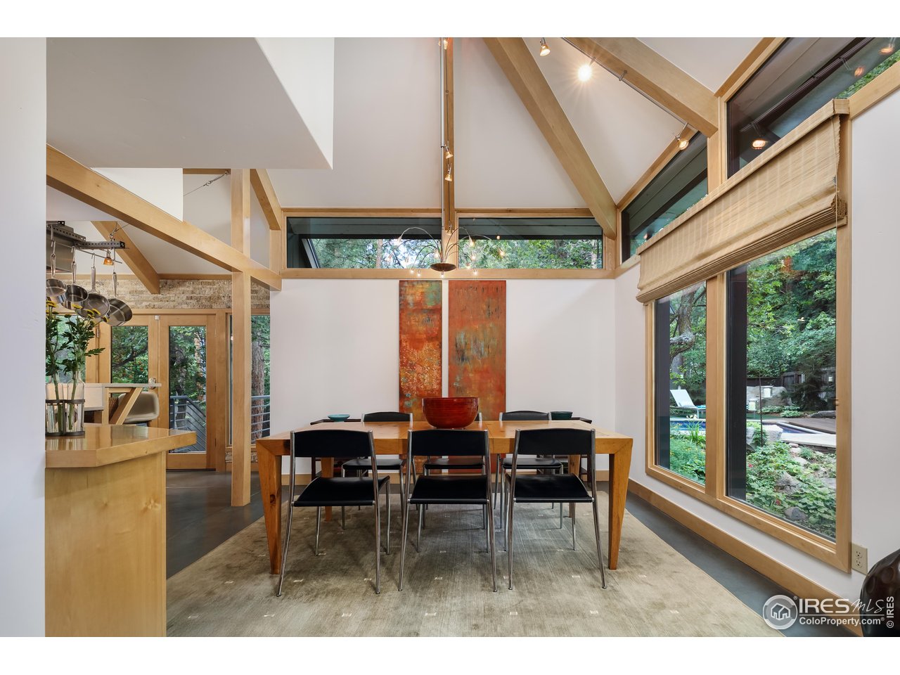 1006 6th Street Boulder, CO 80302 - Photo 8 of 40 a dining room with furniture and a large window
