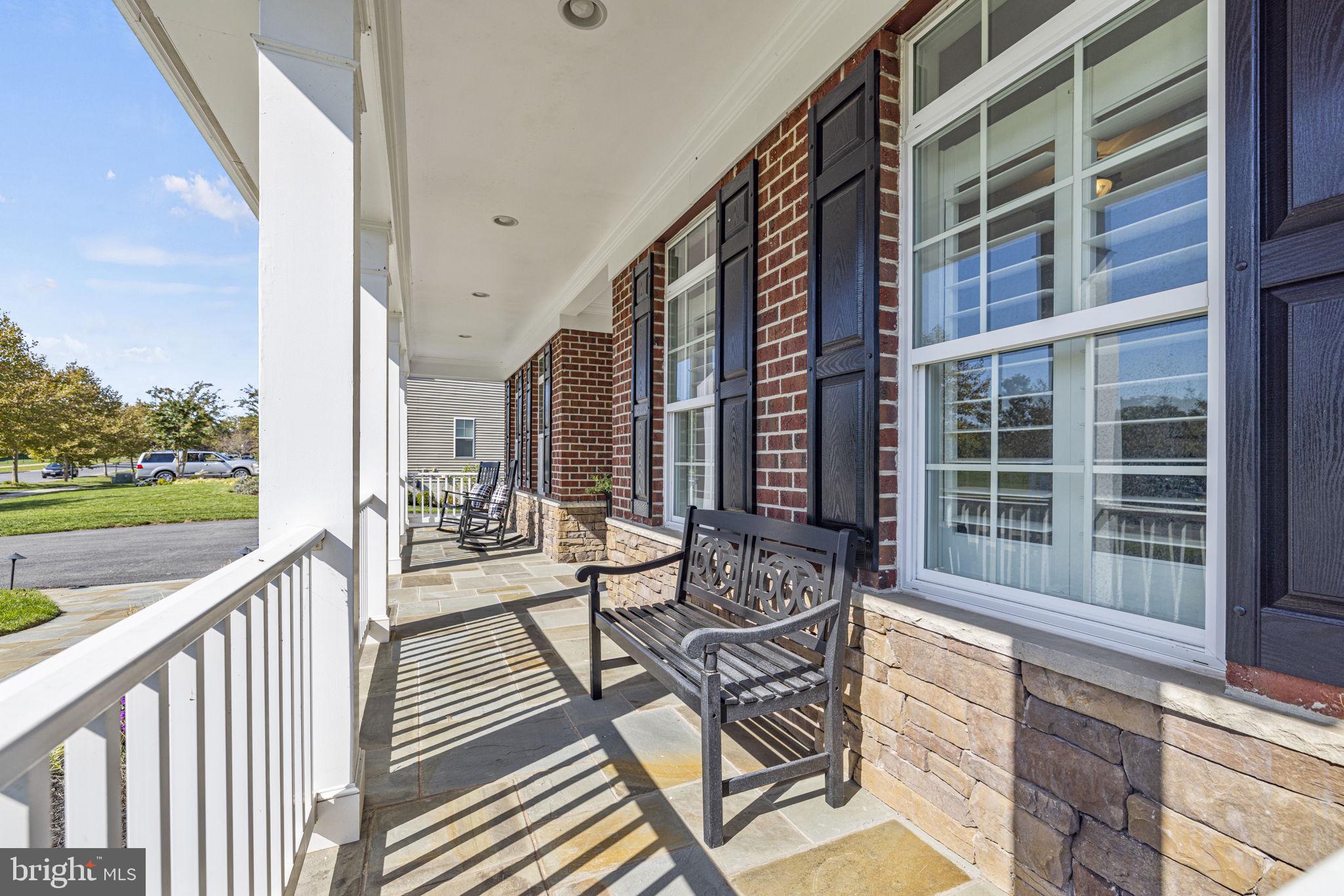 18006 Bliss Drive Poolesville, MD 20837 - Photo 3 of 62 Full-length flagstone front porch