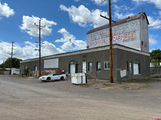 a car parked in front of a building