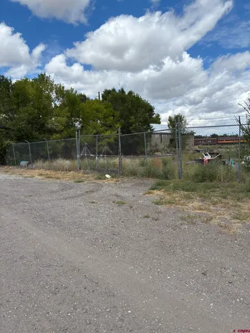a bathroom with a shower and a mirror