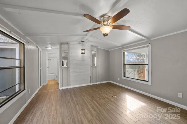 a view of an empty room and window