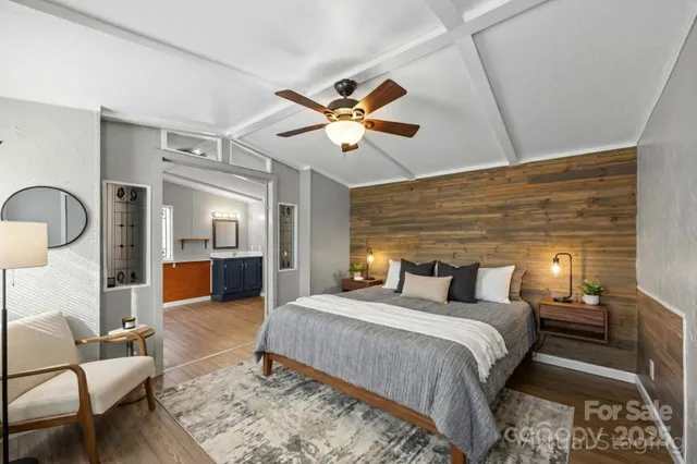 a bedroom with furniture and a fireplace