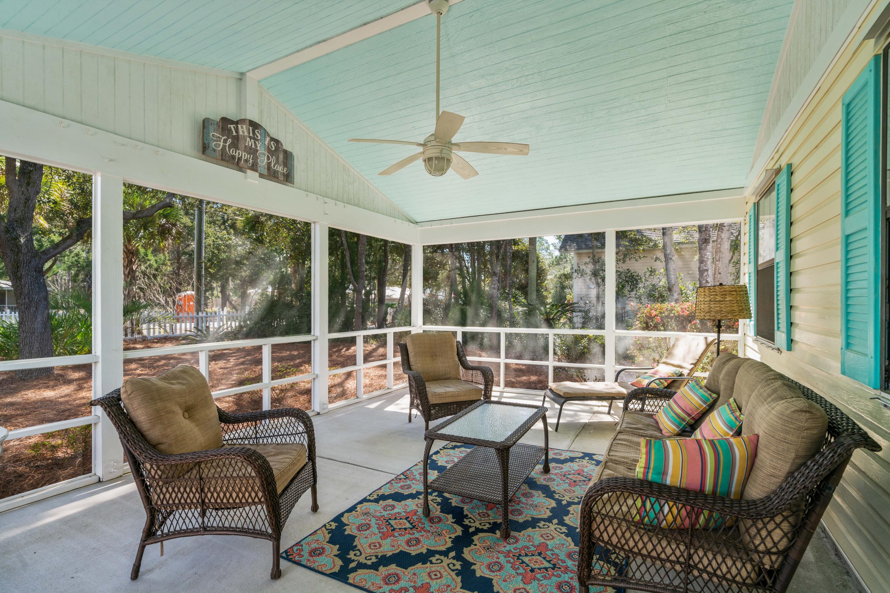 465 Seacrest Drive Inlet Beach, FL 32461 - Photo 13 of 47 a living room with furniture and a window