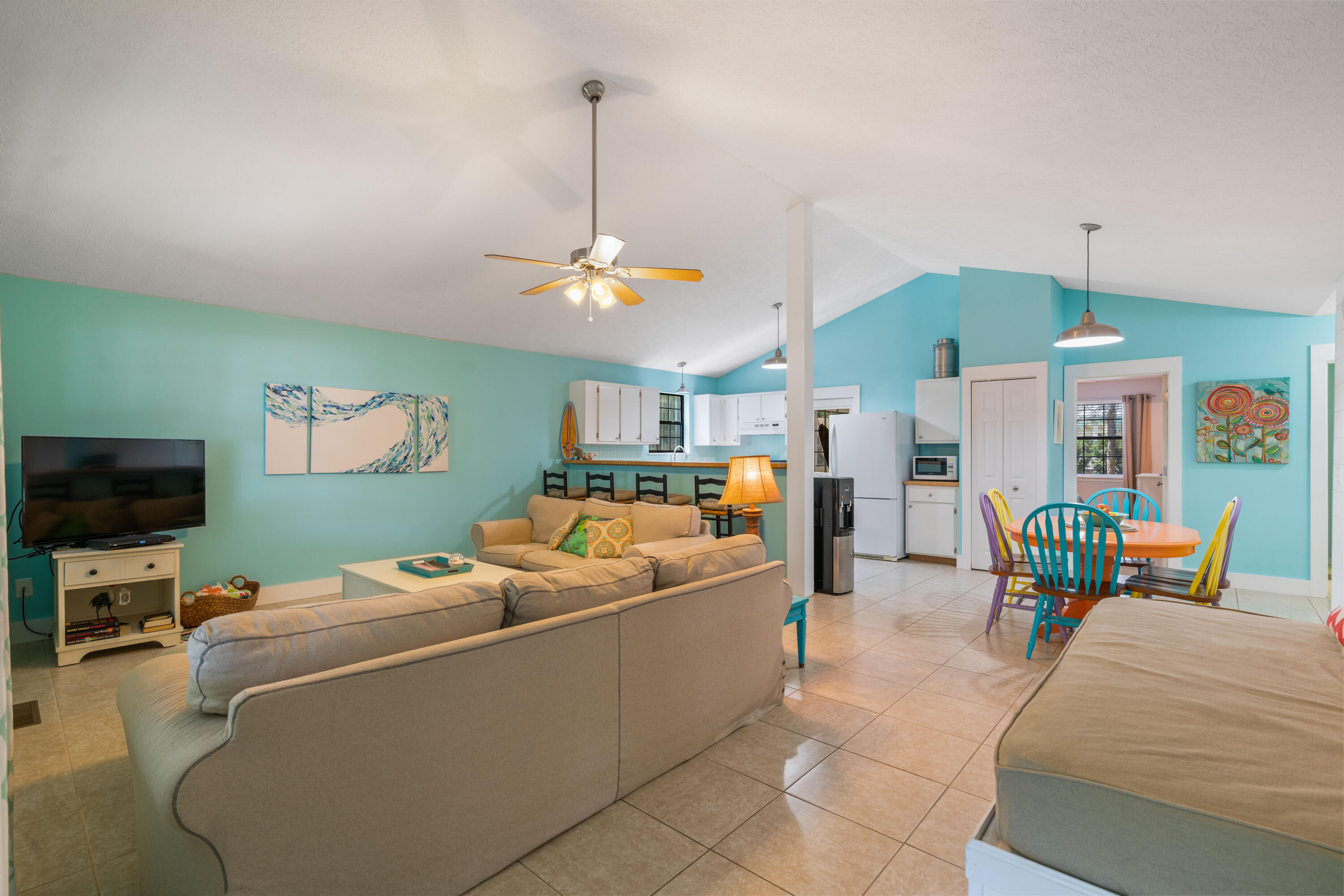 465 Seacrest Drive Inlet Beach, FL 32461 - Photo 16 of 47 a bed room with furniture and a flat screen tv