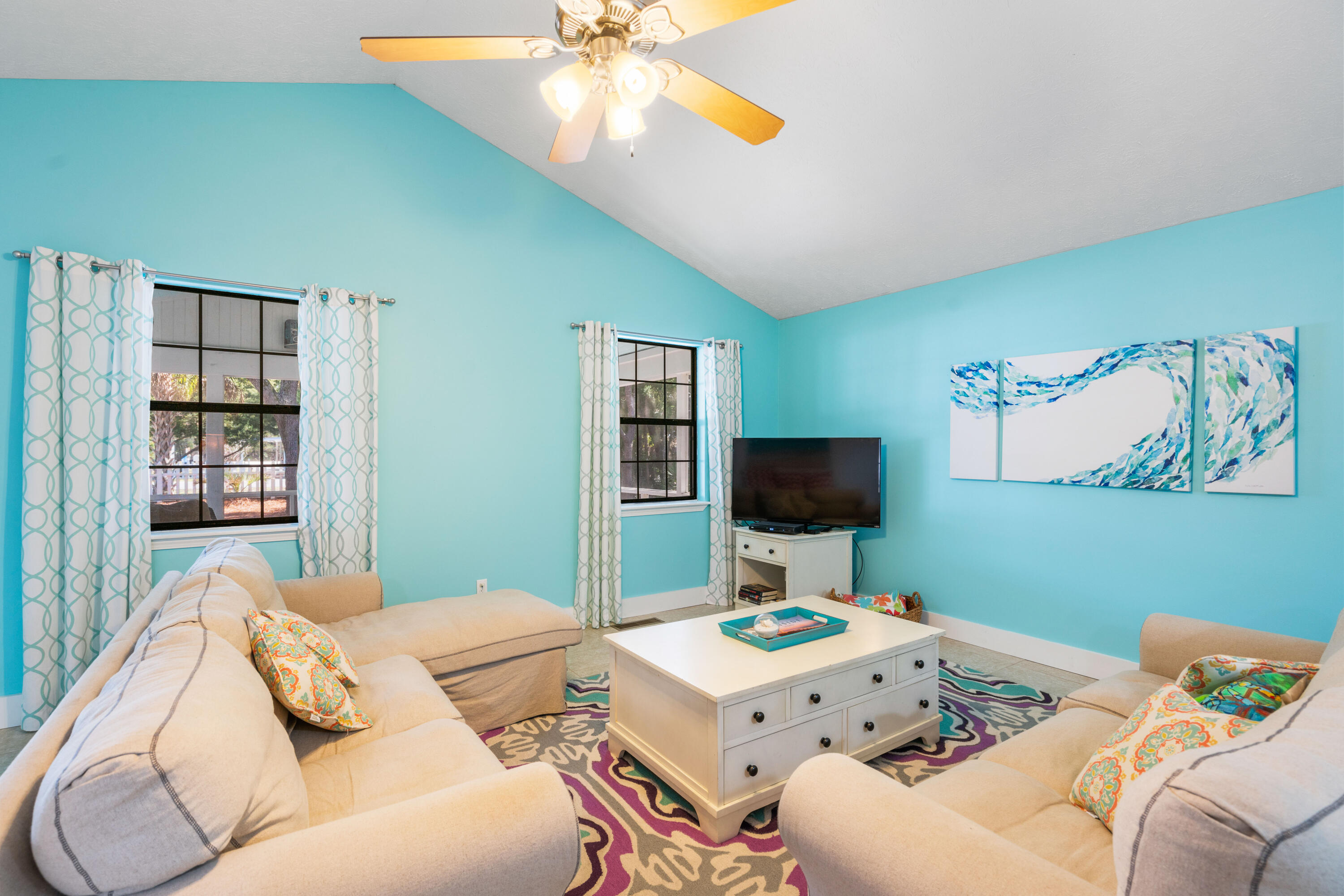 465 Seacrest Drive Inlet Beach, FL 32461 - Photo 17 of 47 a bedroom with a bed and a flat screen tv