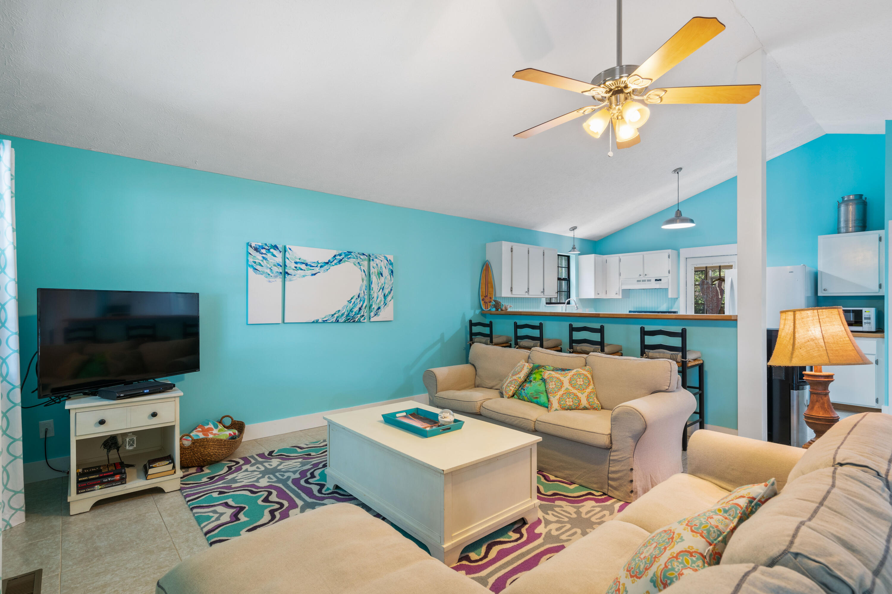 465 Seacrest Drive Inlet Beach, FL 32461 - Photo 18 of 47 a living room with furniture and a flat screen tv