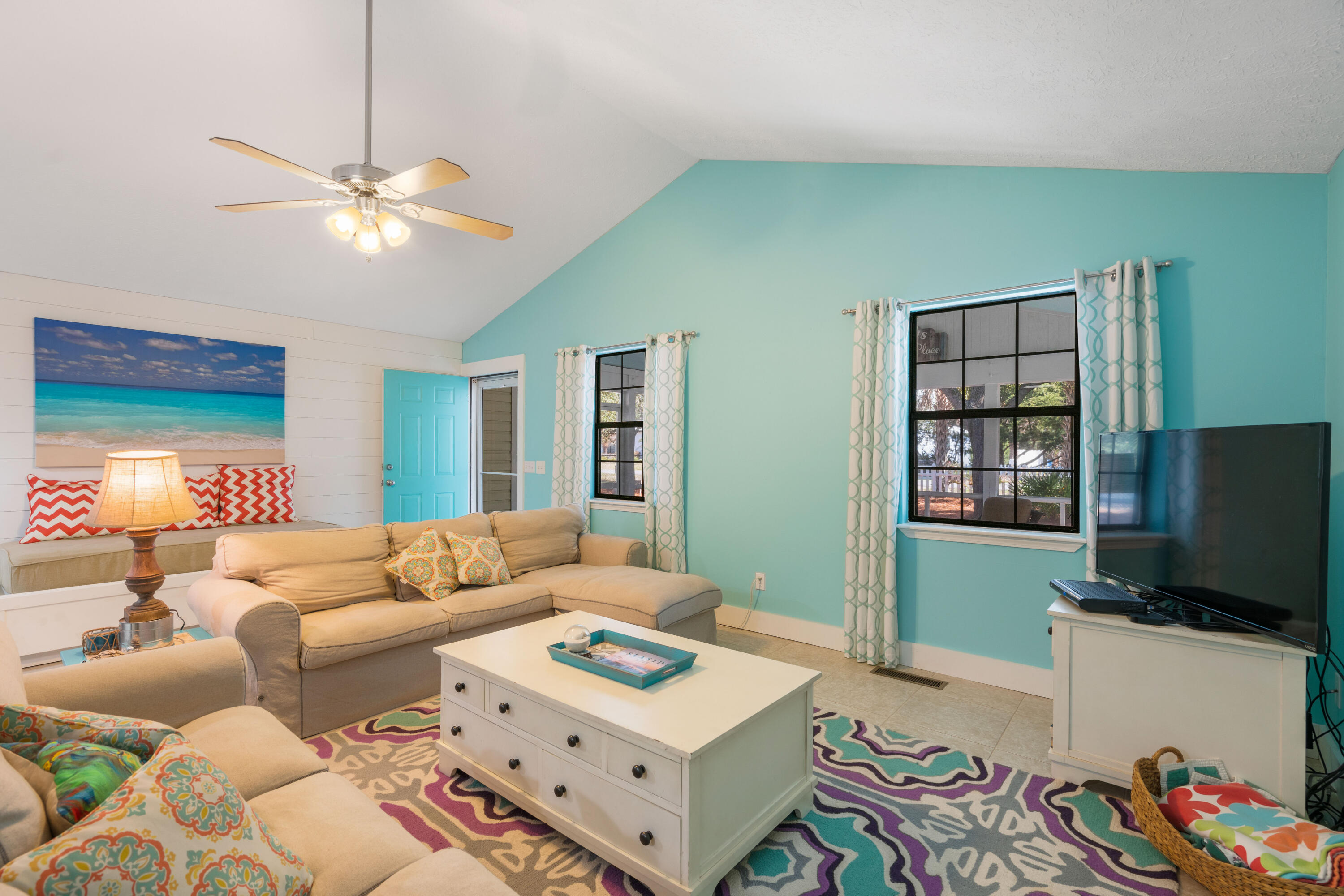 465 Seacrest Drive Inlet Beach, FL 32461 - Photo 19 of 47 a living room with furniture and a flat screen tv