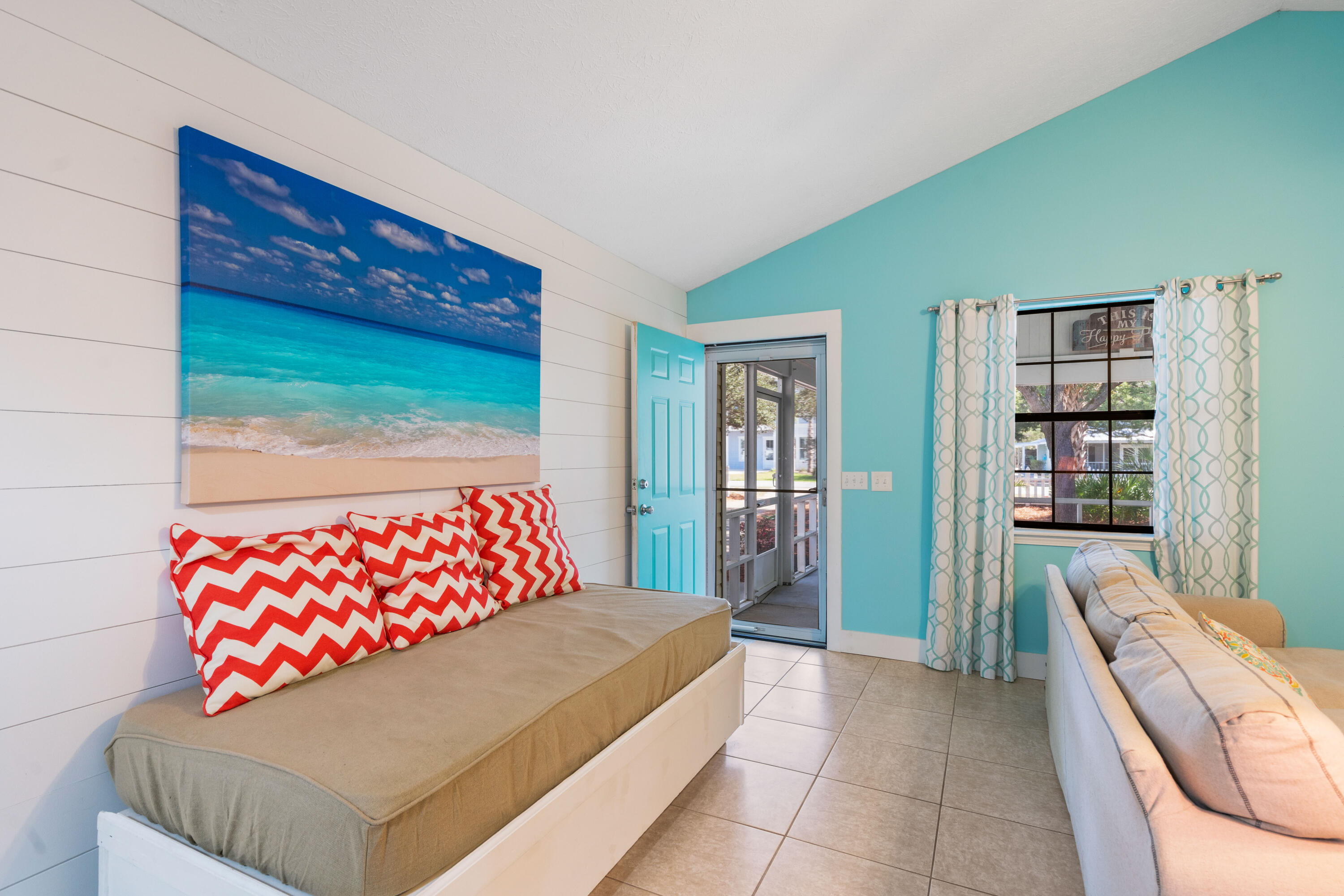 465 Seacrest Drive Inlet Beach, FL 32461 - Photo 20 of 47 a bedroom with a bed and a book shelf