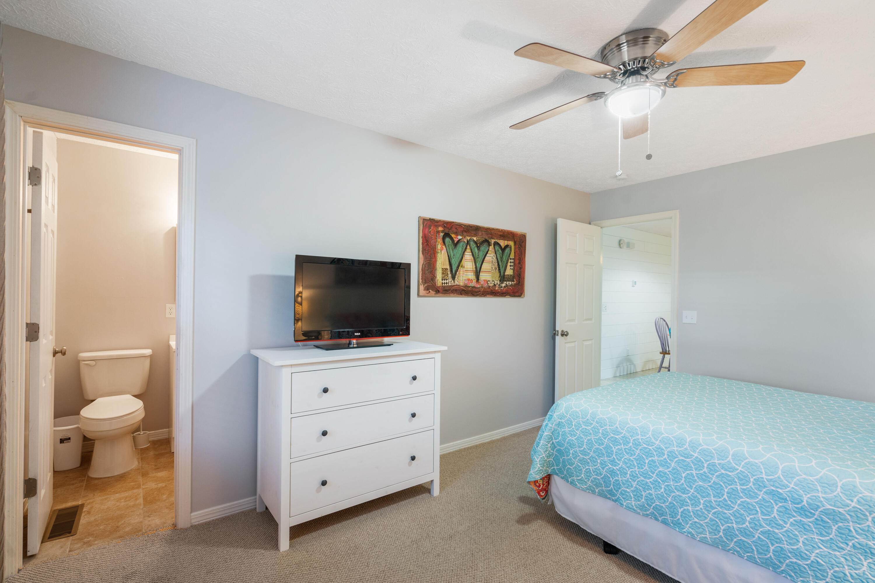 465 Seacrest Drive Inlet Beach, FL 32461 - Photo 29 of 47 a bedroom with a bed and a flat screen tv