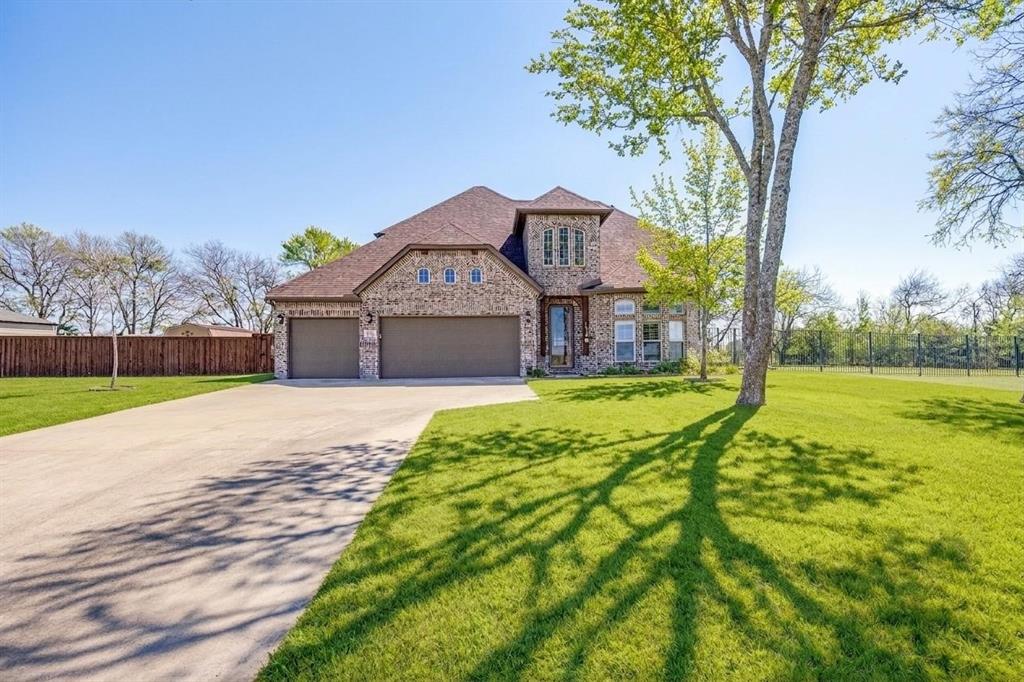 The property is surrounded in trees. Sprinkler system, sod and landscaping projects totaling more the $40,000