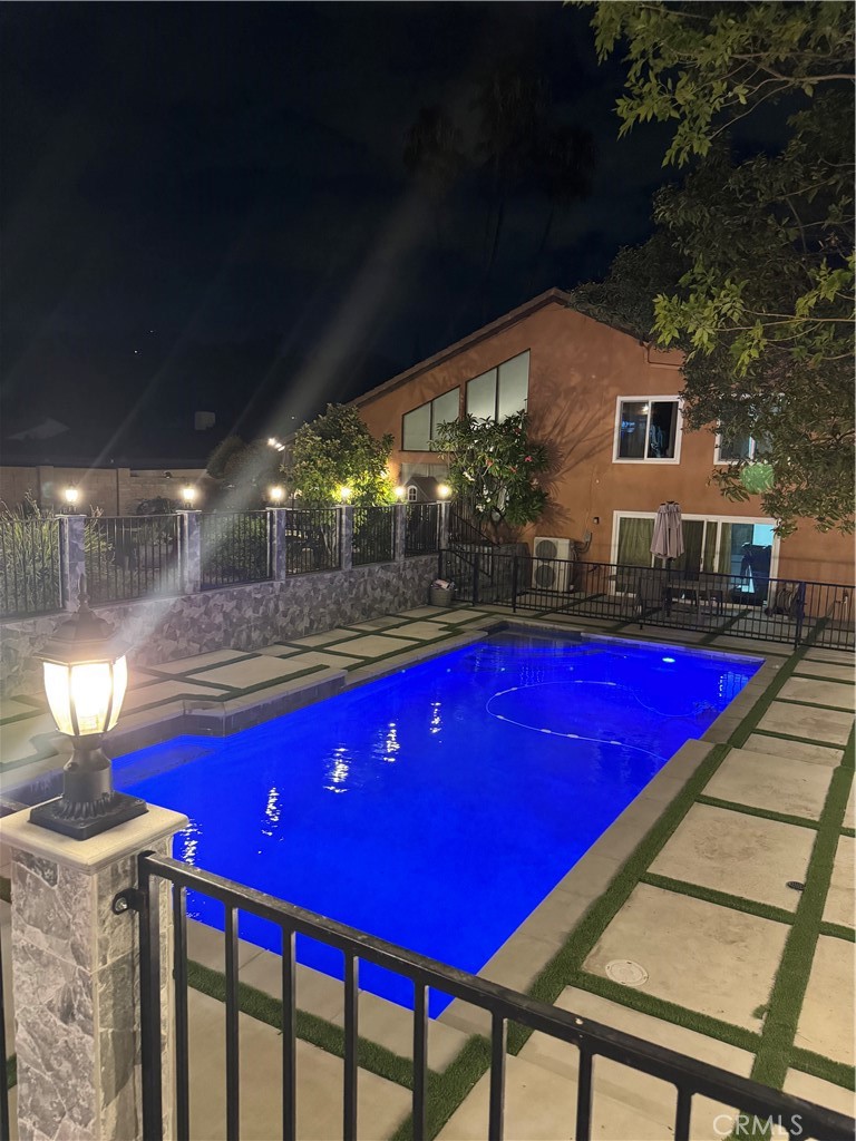 18810 Kirkcolm Lane Porter Ranch, CA 91326 - Photo 55 of 75 a view of an chairs and table in the patio