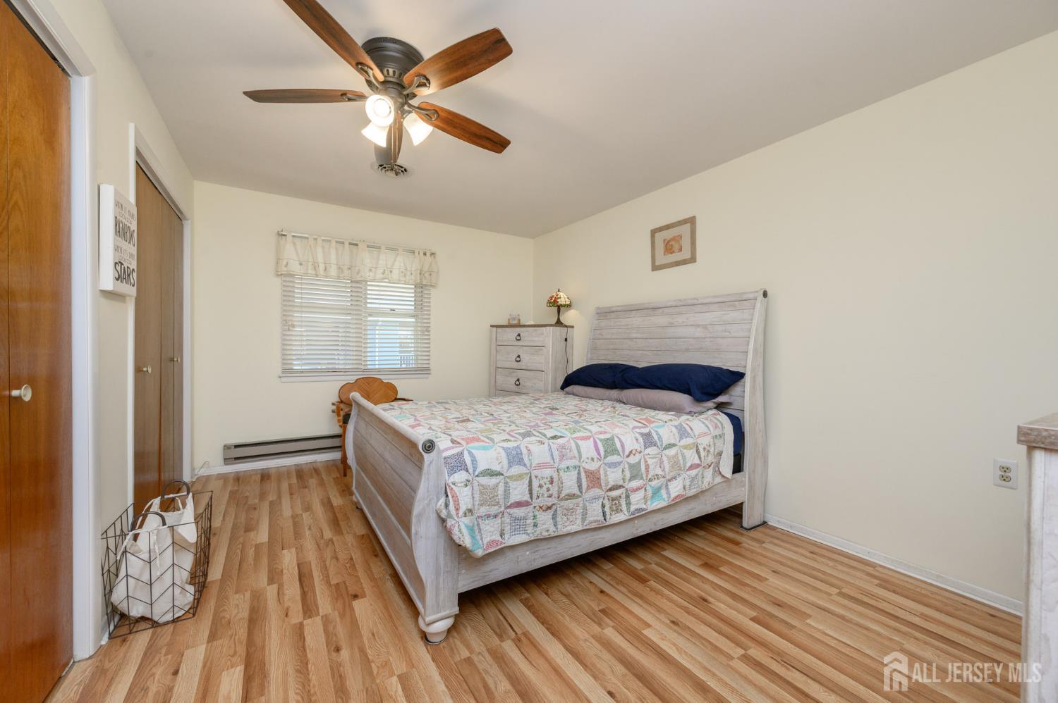 38 Cranberry Road Manahawkin, NJ 08050 - Photo 16 of 23 a bedroom with a bed and window