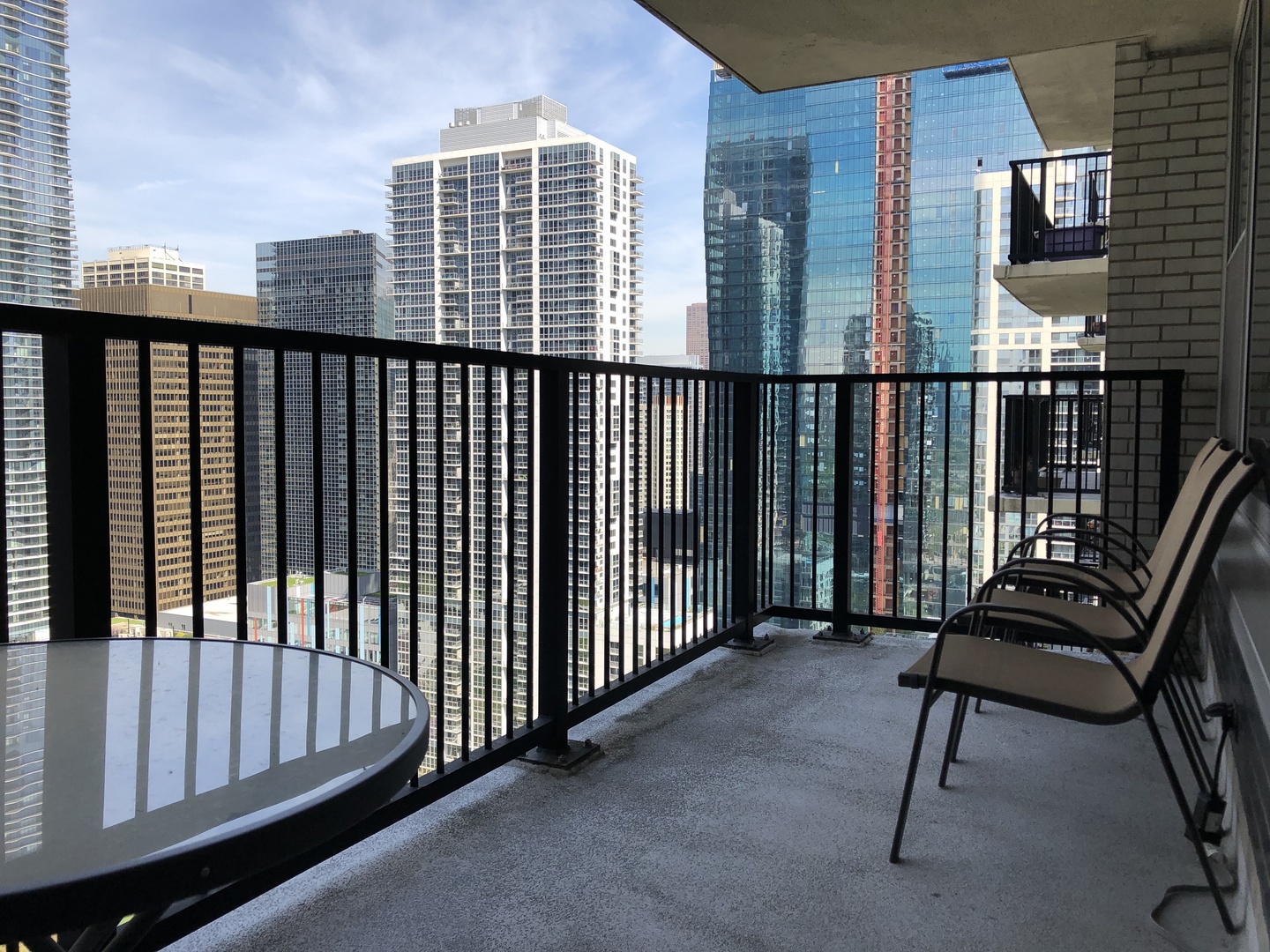 400 East Randolph Street, Unit 3326 Chicago, IL 60601 - Photo 10 of 19 a view of balcony with furniture