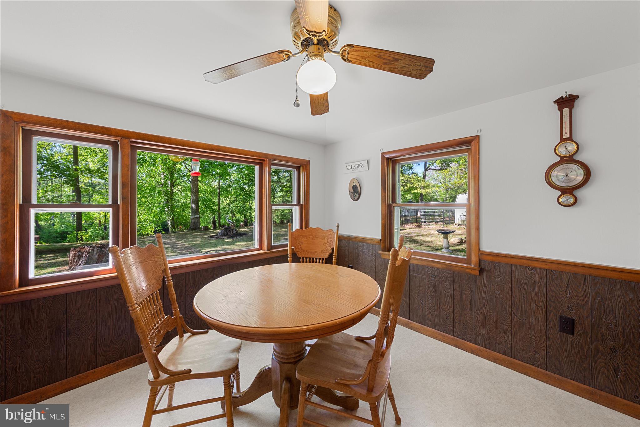 251 Rings End Road Millington, MD 21651 - Photo 10 of 47 a dining room with furniture a chandelier and wooden floor