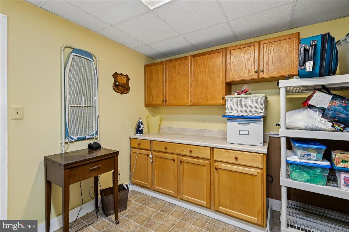 705 Marshall Manor Drive Silver Spring, MD 20905 - Photo 43 of 54 a kitchen with cabinets and appliances
