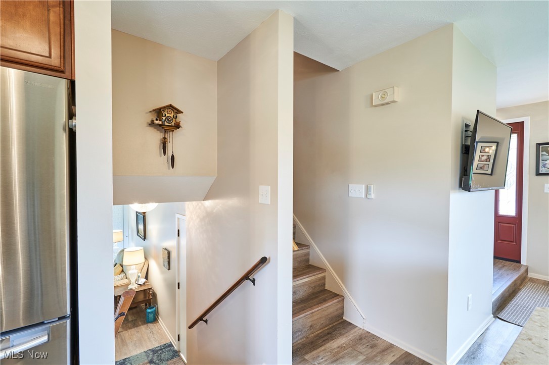 6214 Renninger Road Akron, OH 44319 - Photo 10 of 27 Split stairs- Down to family room, second full bath, laundry closet, basement and garage- Up to the bedrooms