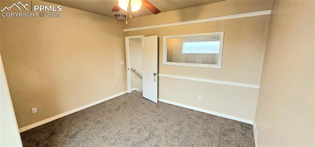 6967 Stetson Ranch Point, Unit 204 Colorado Springs, CO 80922 - Photo 17 of 19 a view of empty room