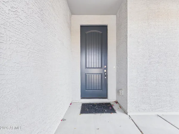a bathroom with a shower and a mirror