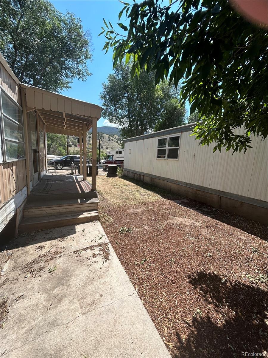 226 Scott Street Salida, CO 81201 - Photo 14 of 15 a view of a backyard with sitting area