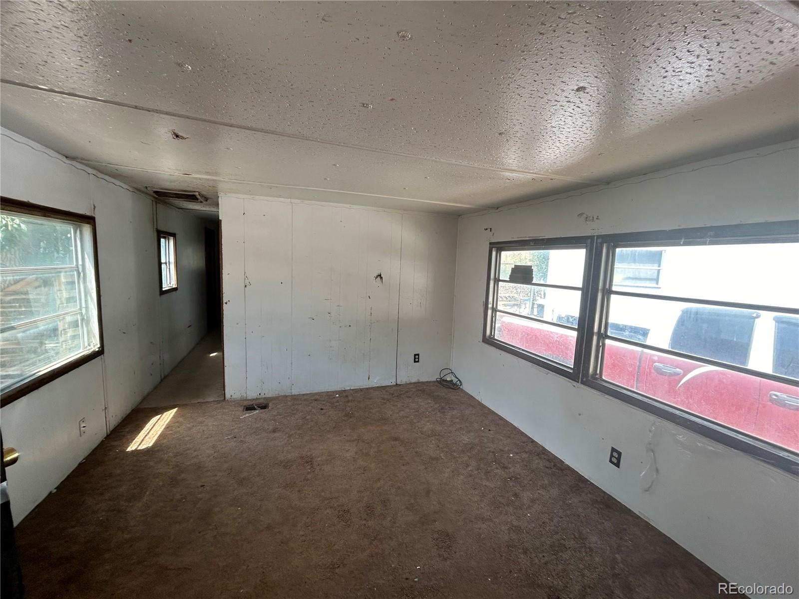 226 Scott Street Salida, CO 81201 - Photo 8 of 15 a view of an empty room with a window