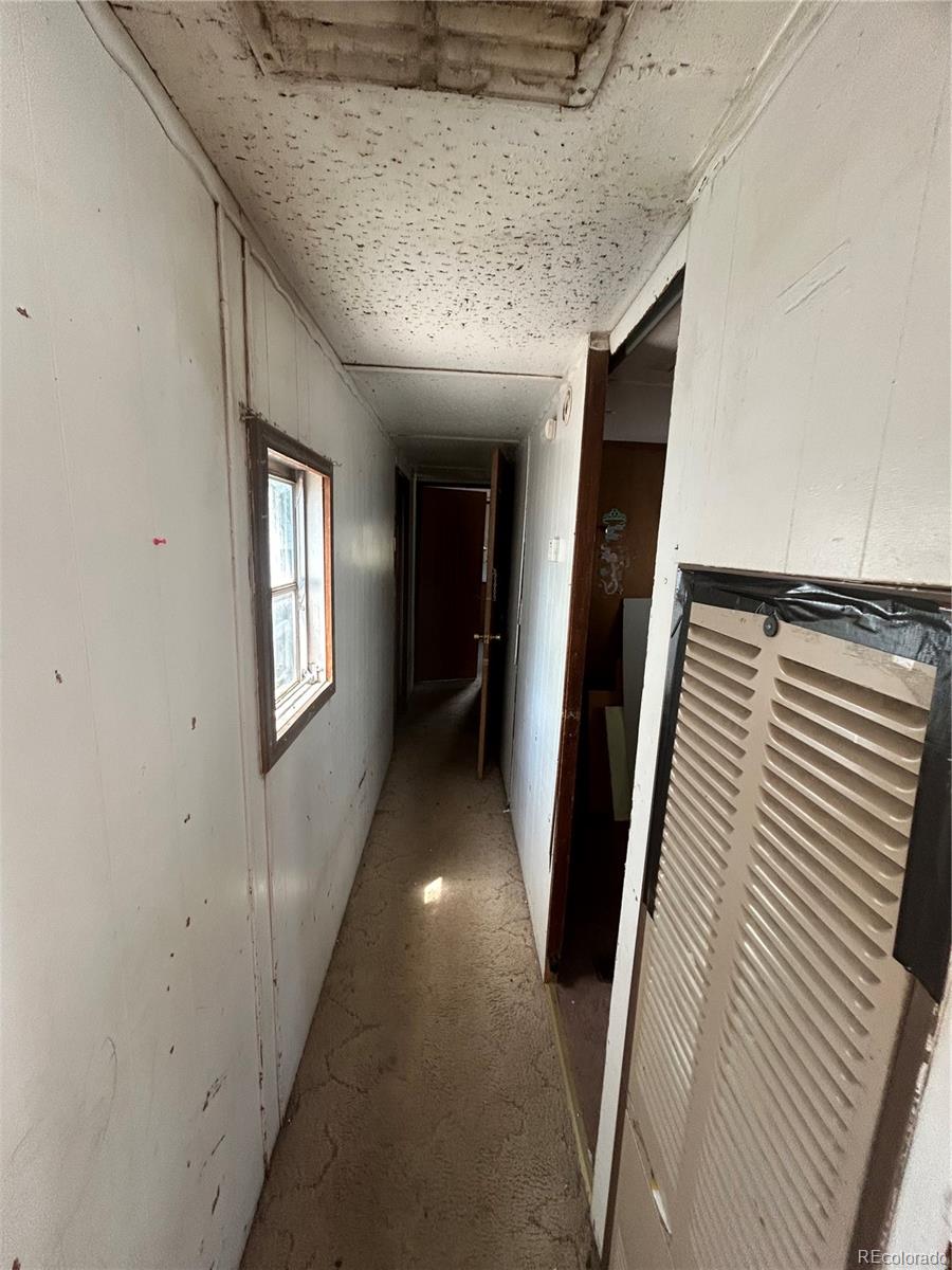 226 Scott Street Salida, CO 81201 - Photo 9 of 15 a view of hallway with stairs