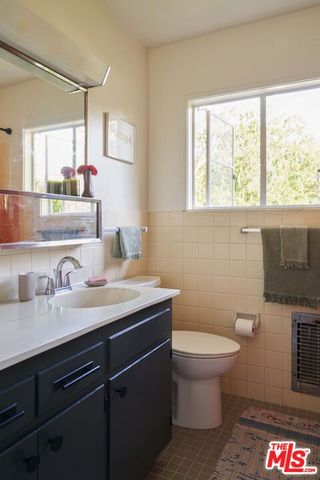 a vase of flowers sitting on a table