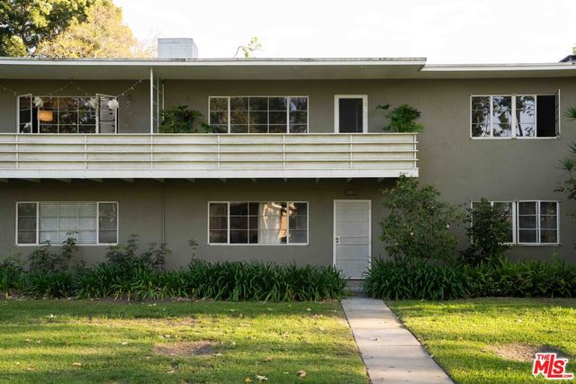 a house view with a outdoor space