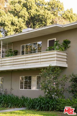 a view of swimming pool with an outdoor space and seating area