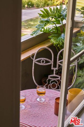 a view of swimming pool from a balcony