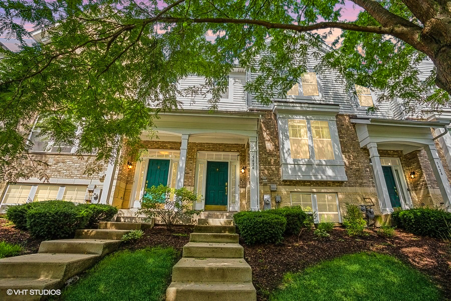 5426 Cloverdale Road Hanover Park, IL 60133 - Photo 1 of 22 a front view of a house with garden