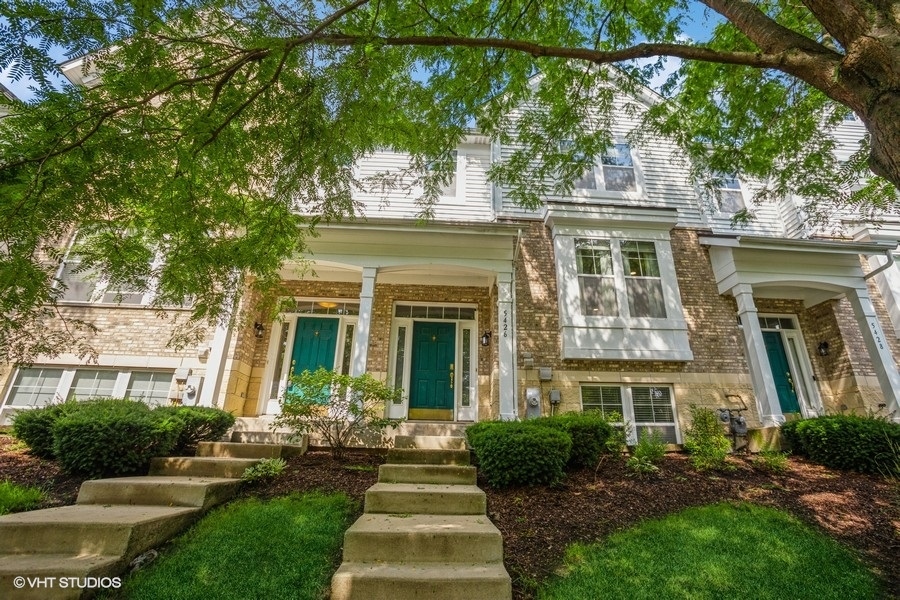 5426 Cloverdale Road Hanover Park, IL 60133 - Photo 2 of 22 a front view of a house with a yard