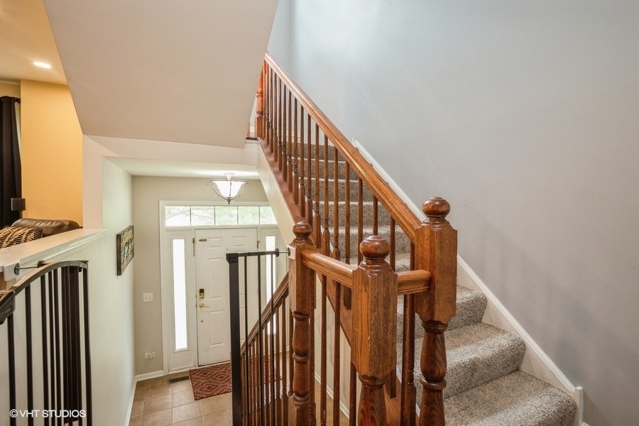 5426 Cloverdale Road Hanover Park, IL 60133 - Photo 3 of 22 a view of entryway and hall with wooden floor