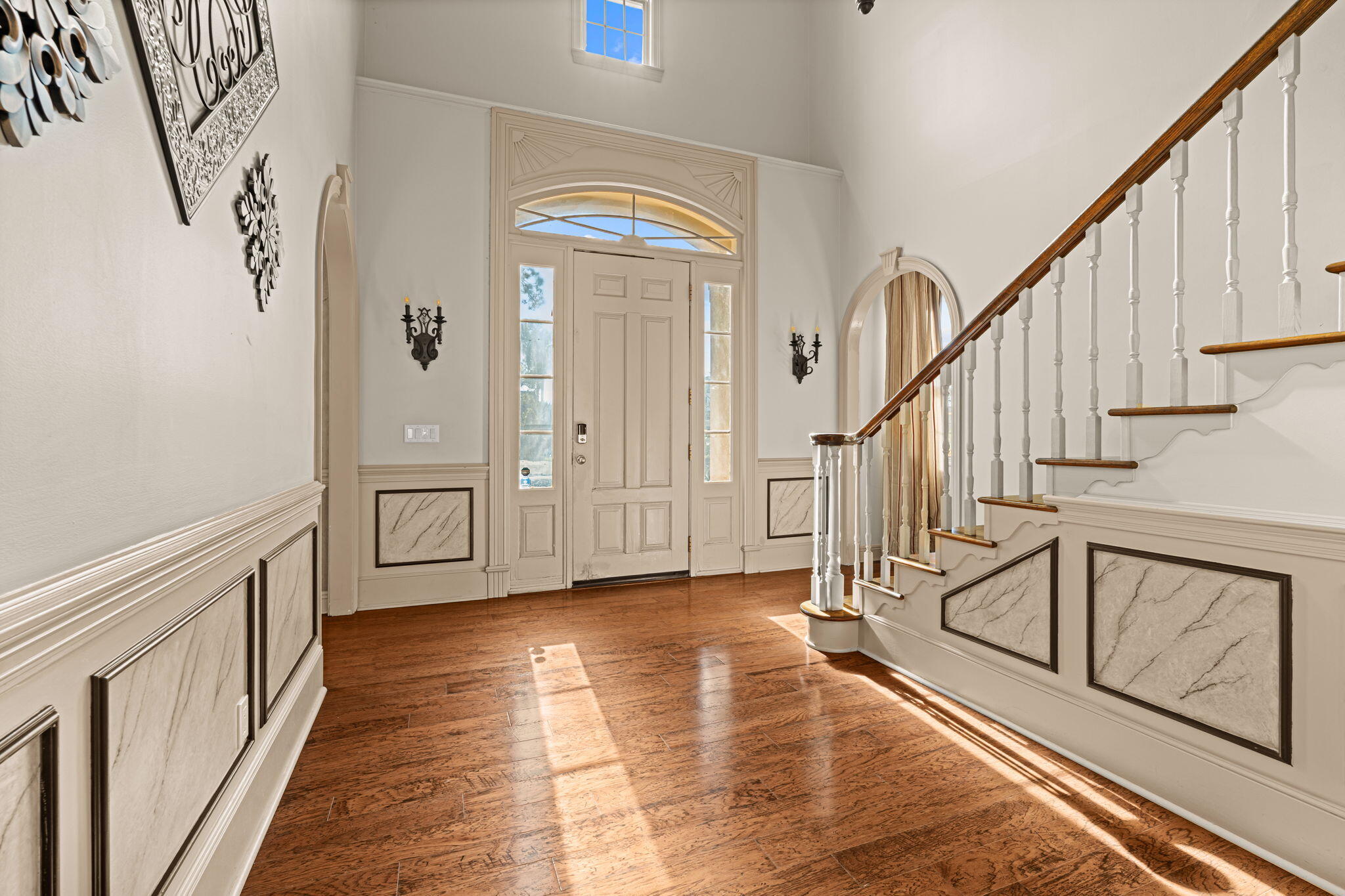 322 Wahoo Road Panama City Beach, FL 32408 - Photo 14 of 57 a view of an entryway with wooden floor