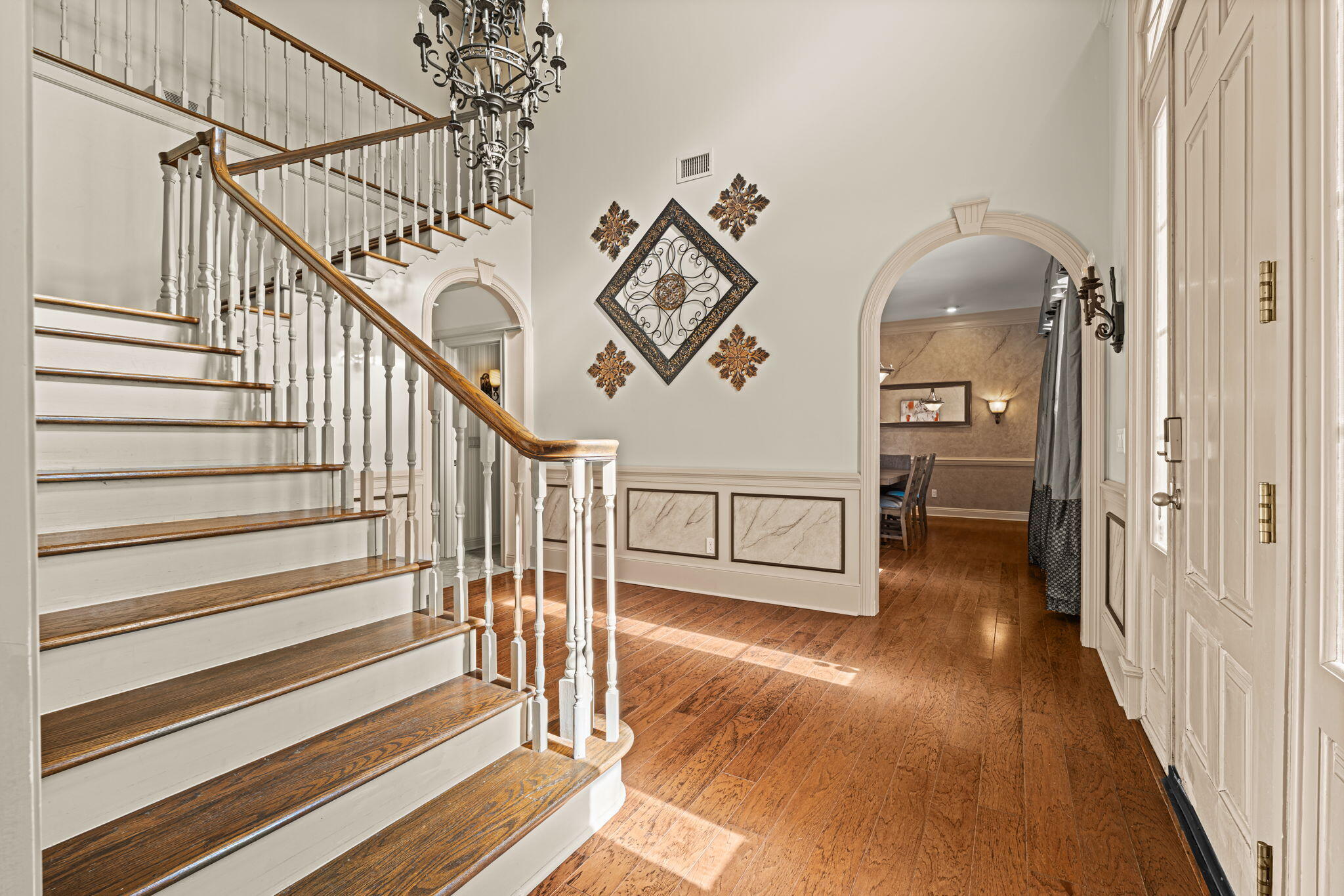 322 Wahoo Road Panama City Beach, FL 32408 - Photo 15 of 57 a view of entryway and hall with wooden floor